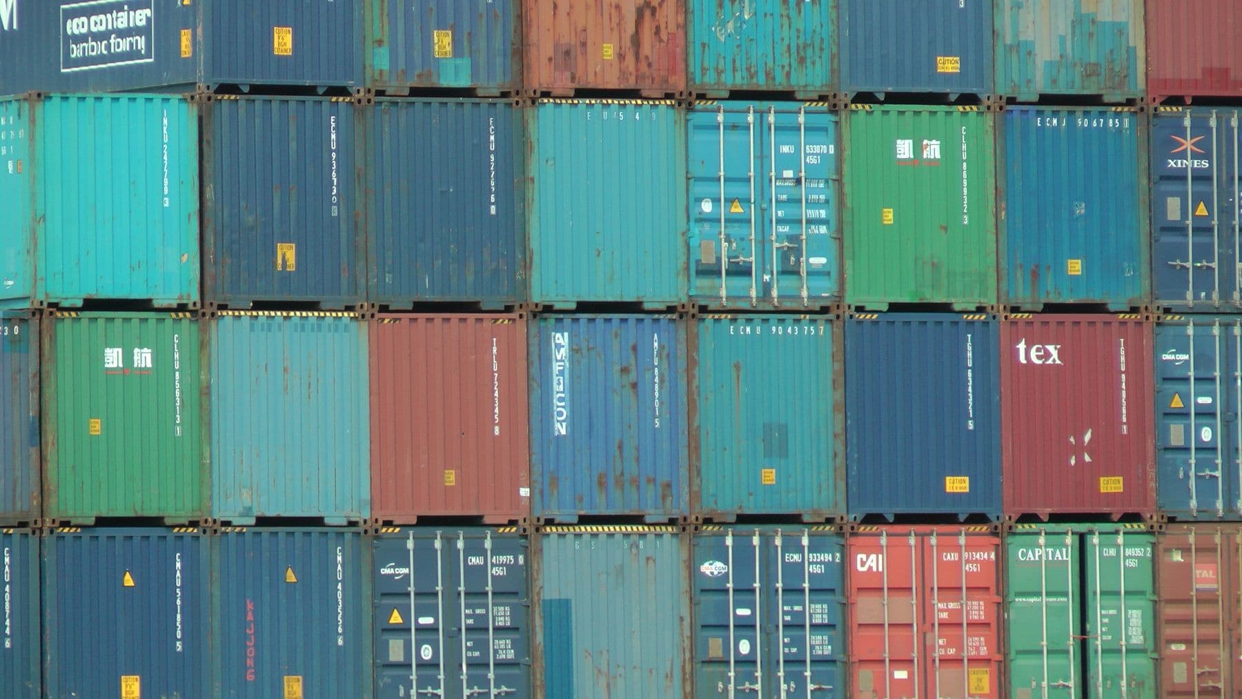 Stacked shipping containers at a port